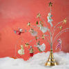 Golden  Star Ornament Stand by Patience Brewster